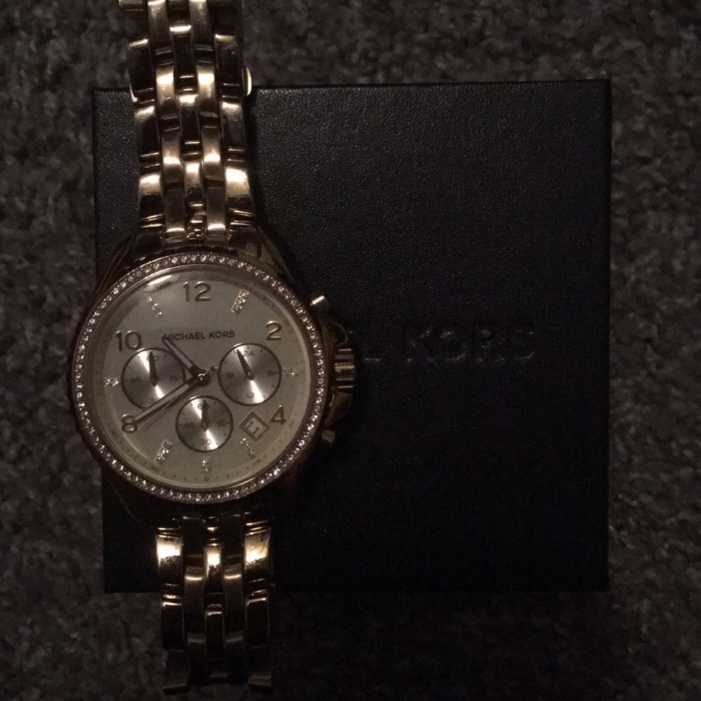 woman’s michael kors gold watch